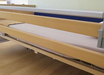 Clip-on safety side rail for care beds from Burmeier